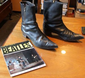 Beatle Boots and show programme from the collection of Garry Bell Auckland photo RNZ Sam Wicks cropped